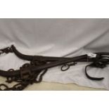 Pair of antique iron horse hames with chains