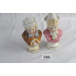 Pair of porcelain bust figurines, man and woman, ht 16cm