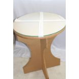 Glass topped round table on two-piece wooden base