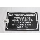 Cast iron 'No trespassing' sign