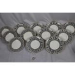 Wedgwood 'Florentine Black 'dinner service in excellent condition: 8 dinner plates, 2 sauce boats