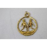 18ct gold cast Gemini star sign pendant, which is inscribed Cartier in France. Weight