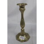 Plated metal candlestick with decorative chasing, ht 25cm