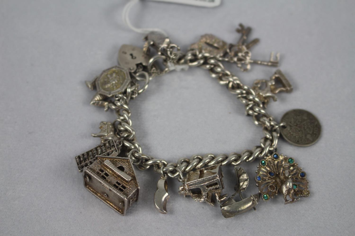 Heavy silver charm bracelet 57.3g - Image 2 of 2