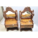 A characterful pair of solid wood rococo style bedside tables or dressing table top units, each with