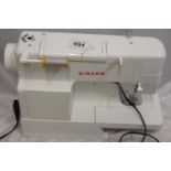 A modern Singer sewing machine, model no 5805C, appears to be in good working condition after a