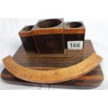 Elegant Art Deco desk set; detailed with two wood finishes, three compartments and decorative curved