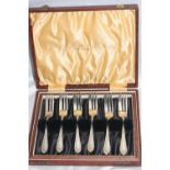 Set of six English silver plated cake forks in original leather case