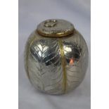 Chinese wood jar covered in sheet white metal