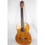 A classical guitar in good condition