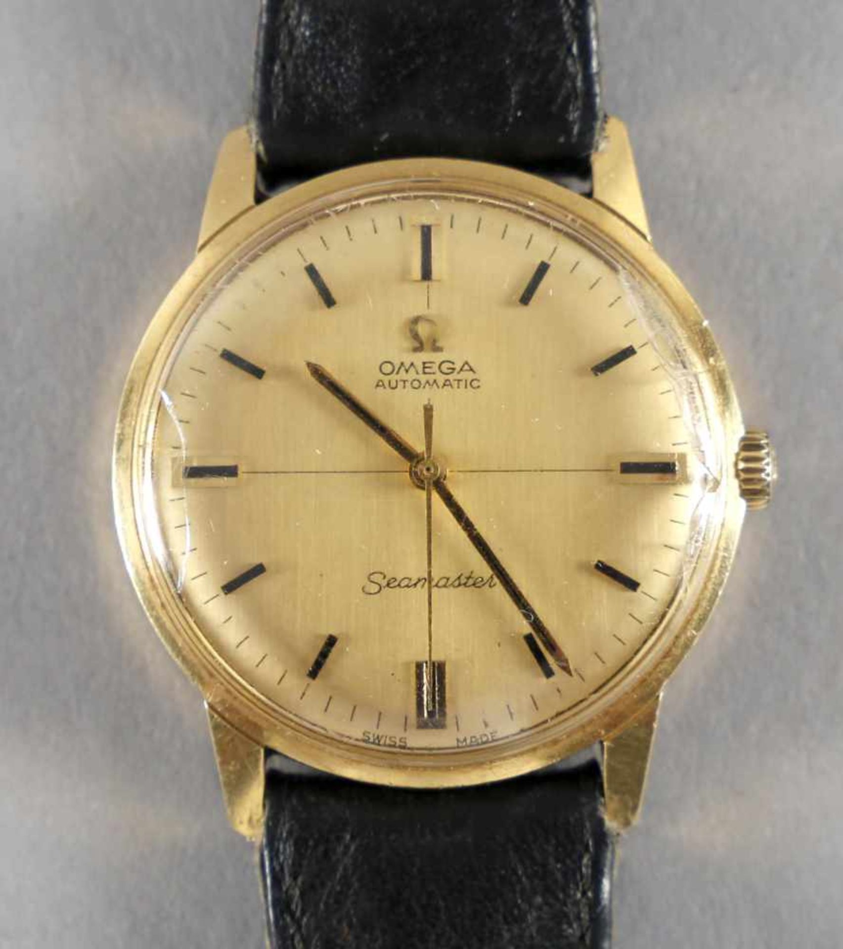 Omega Seamaster Herrenarmbanduhr, 750er GG, wohl 1960er Jahre