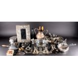 A large quantity of silver plated items  to include wine coasters, a framed mirror, flatware and