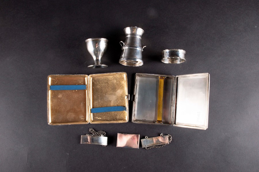 A mixed group of small silver items comprising two cigarette cases, a pepper modelled as a milk - Image 4 of 4