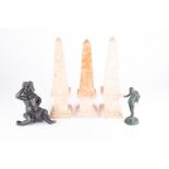 A 20th century pink marble obelisk together with a pair of similar style obelisks, two Classical