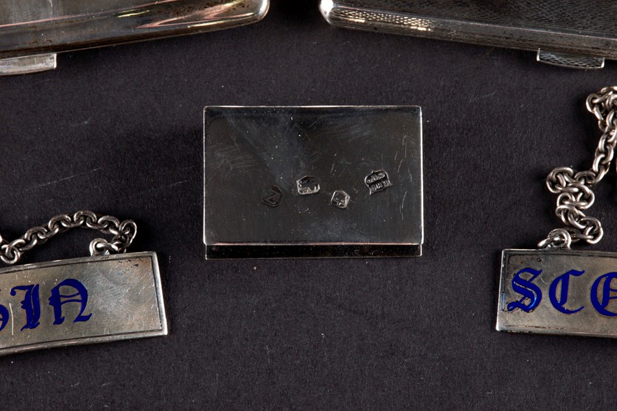 A mixed group of small silver items comprising two cigarette cases, a pepper modelled as a milk - Image 2 of 4