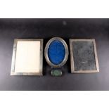Four assorted silver picture frames the largest 28.5 cm x 23 cm (full dimensions), various dates and