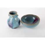 A Jun ware purple splash stoneware tea bowl with crackled blue glaze, together with a Jun ware