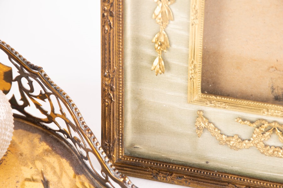 A French early 20th century bronze mounted frame with glazed front and gilt bronze swags, together - Image 2 of 7