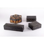 A small collection of Anglo-Indian ebony boxes to include a 19th century box profusely carved with