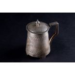 A Russian Pan-Slavic lidded tankard assayed in Moscow, 1880, engraved decoration on four, shaped