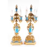A pair of large 19th century French ormolu and enamel candelabra with four swept branches