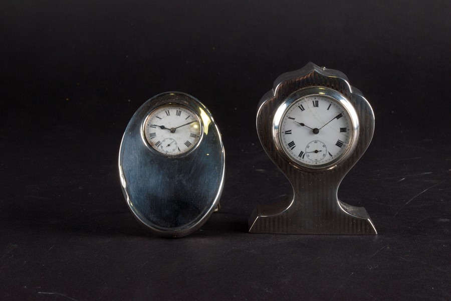 An Edwardian small silver desk clock (the case) Birmingham 1911, by Joseph Gloster Ltd, of heart- - Image 3 of 7