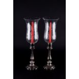A pair of early 20th century Baccarat style hurricane lamps the two etched glass shades with
