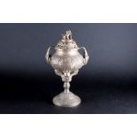 A Chinese white metal incense burner 20th century, with dog of fo finial, elephant handles and