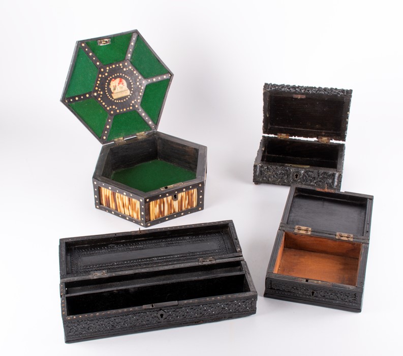 A small collection of Anglo-Indian ebony boxes to include a 19th century box profusely carved with - Image 3 of 5