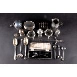 A mixed group of small silver items to include a pair of Victorian berry spoons, a Continental