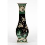 A Chinese late Qing dynasty famille verte porcelain vase with faceted body decorated with enamel