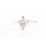 An 18ct yellow gold and diamond ring set with a single marquise-cut diamond of approximately 0.60