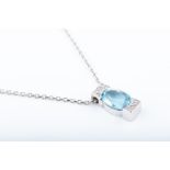 An aquamarine and diamond pendant of rectangular form, set with a mixed oval-cut aquamarine, mounted