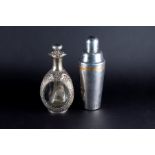 A Chinese Hong Kong silver mounted dimple decanter with pierced mount designed with scrolls and