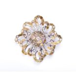 A multi-coloured natural fancy diamond brooch of floral design, the rounded centre set with a