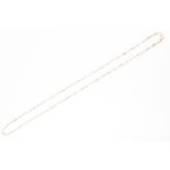 An opera length natural pearl necklace comprised of graduated cream/white, yellow, orange/yellow,