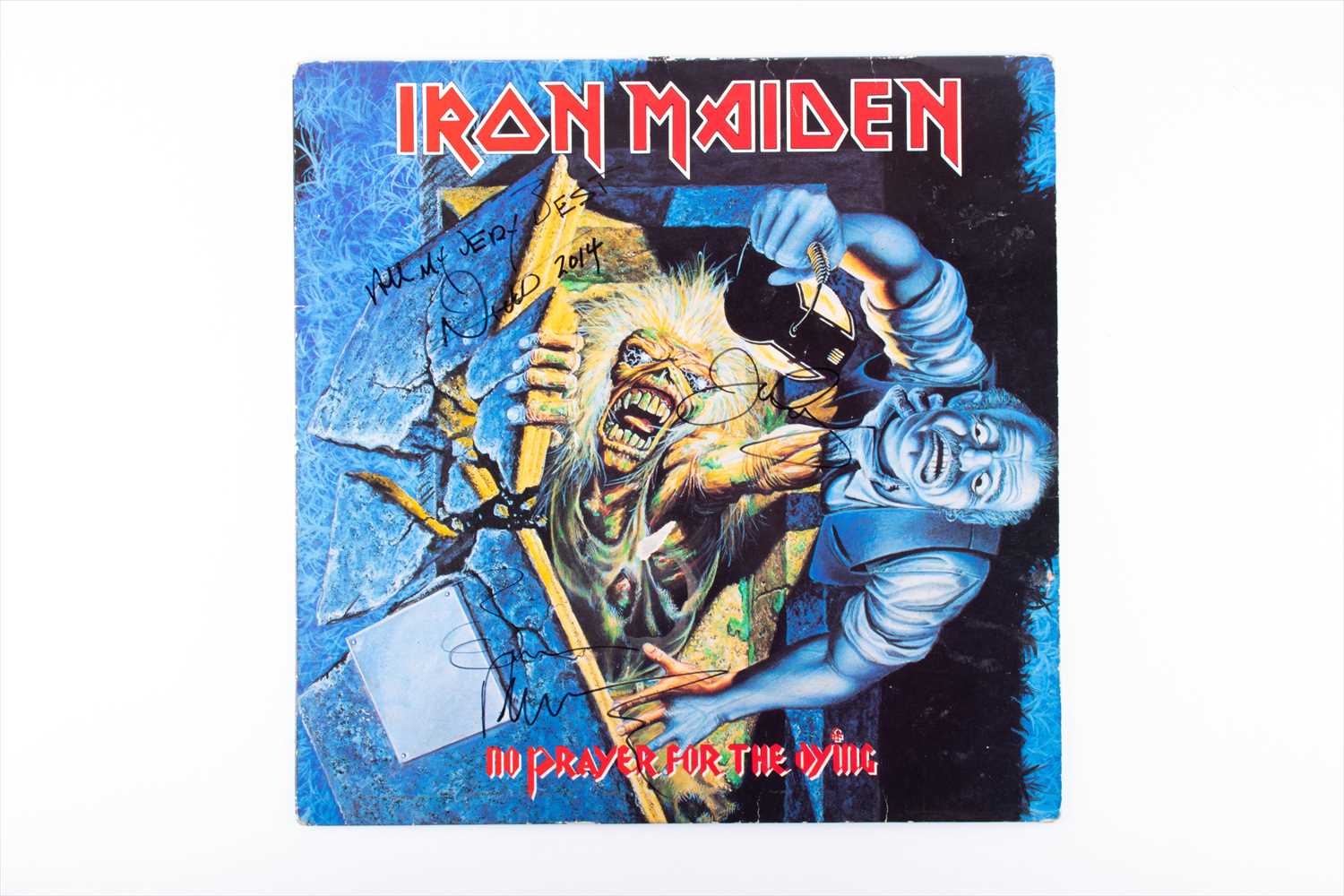 Iron Maiden: a signed 'No Prayer for the Dying' LP the cover with three band signatures, obtained in