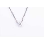 An 18ct white gold and solitaire diamond pendant necklacethe round brilliant-cut diamond of