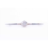 A 15ct white and yellow gold diamond cluster bar broochset with a daisy cluster of round-cut