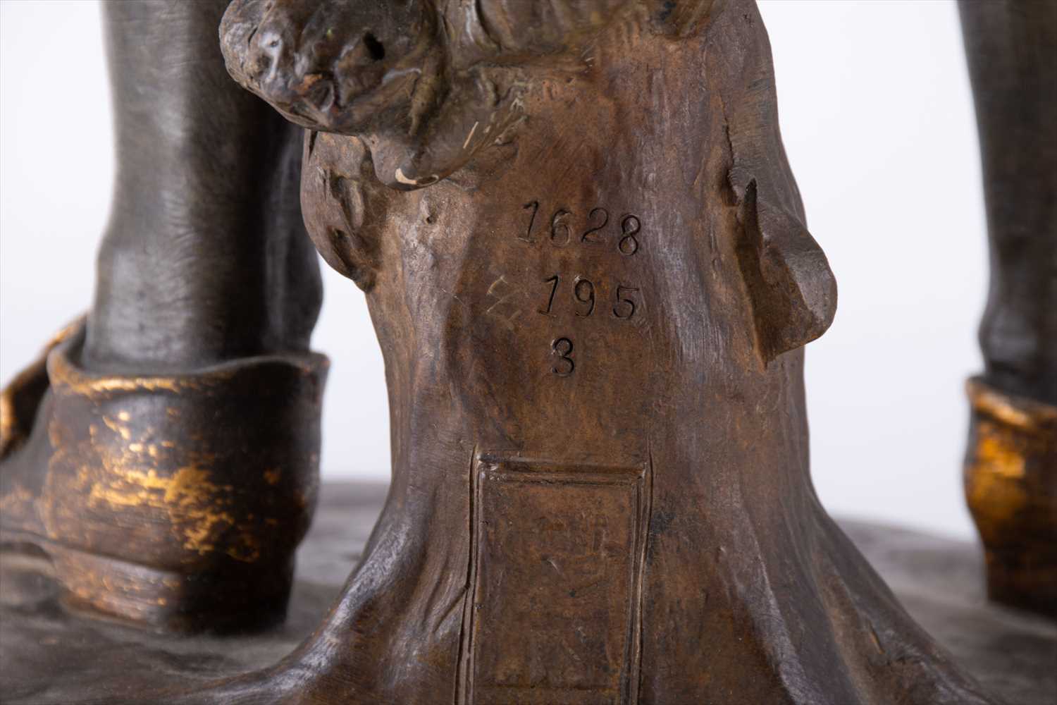A large Goldscheider bronzed earthenware figure of a finely dressed boy his hands in his pockets - Image 6 of 9