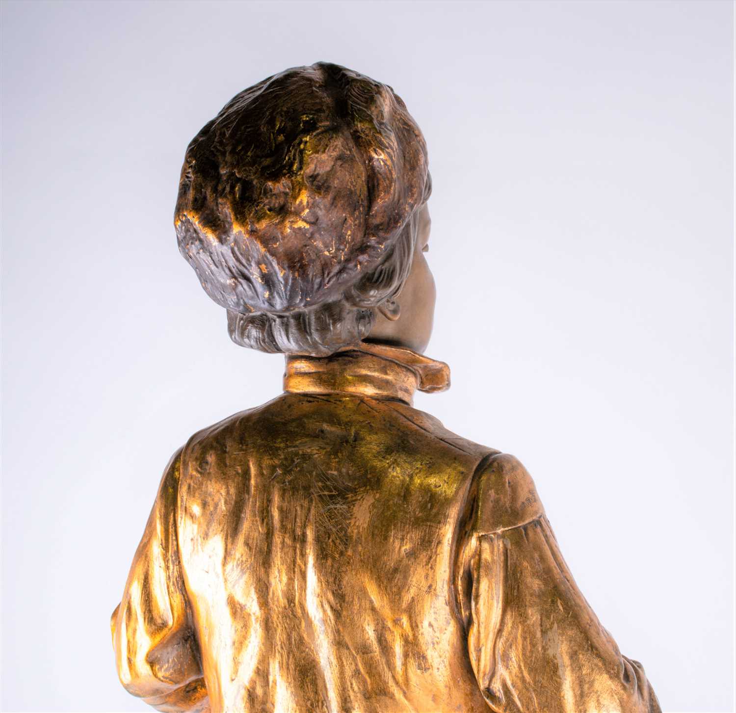 A large Goldscheider bronzed earthenware figure of a finely dressed boy his hands in his pockets - Image 5 of 9