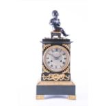 A late 19th century French thinly cast bronze and ormolu mounted mantel clock with bronze putti