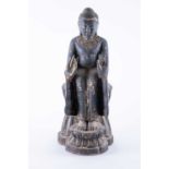 A 20th century Chinese carved wood model of Buddha seated on a stylised double-lotus chair.42 cm