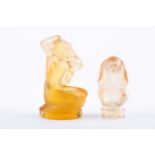 Two Lalique glass paperweightsboth signed Lalique "circle R" France, one being a monkey holding it's