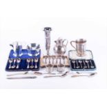 A mixed group of small silver items comprising a trumpet form spill vase, a matching sugar bowl