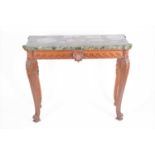 A late 19th century marble-topped oak console table with carved sea scroll and shell frieze, on