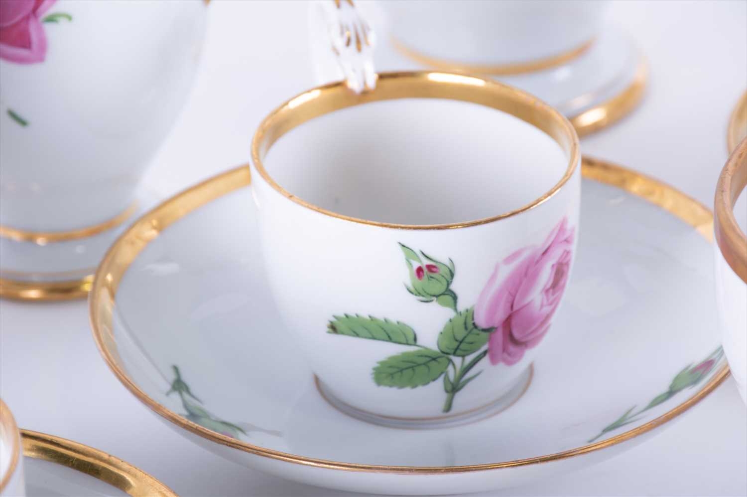 A collection of Meissen pink rose pattern teawares comprising teapot, coffee pot, four cups and - Image 8 of 10