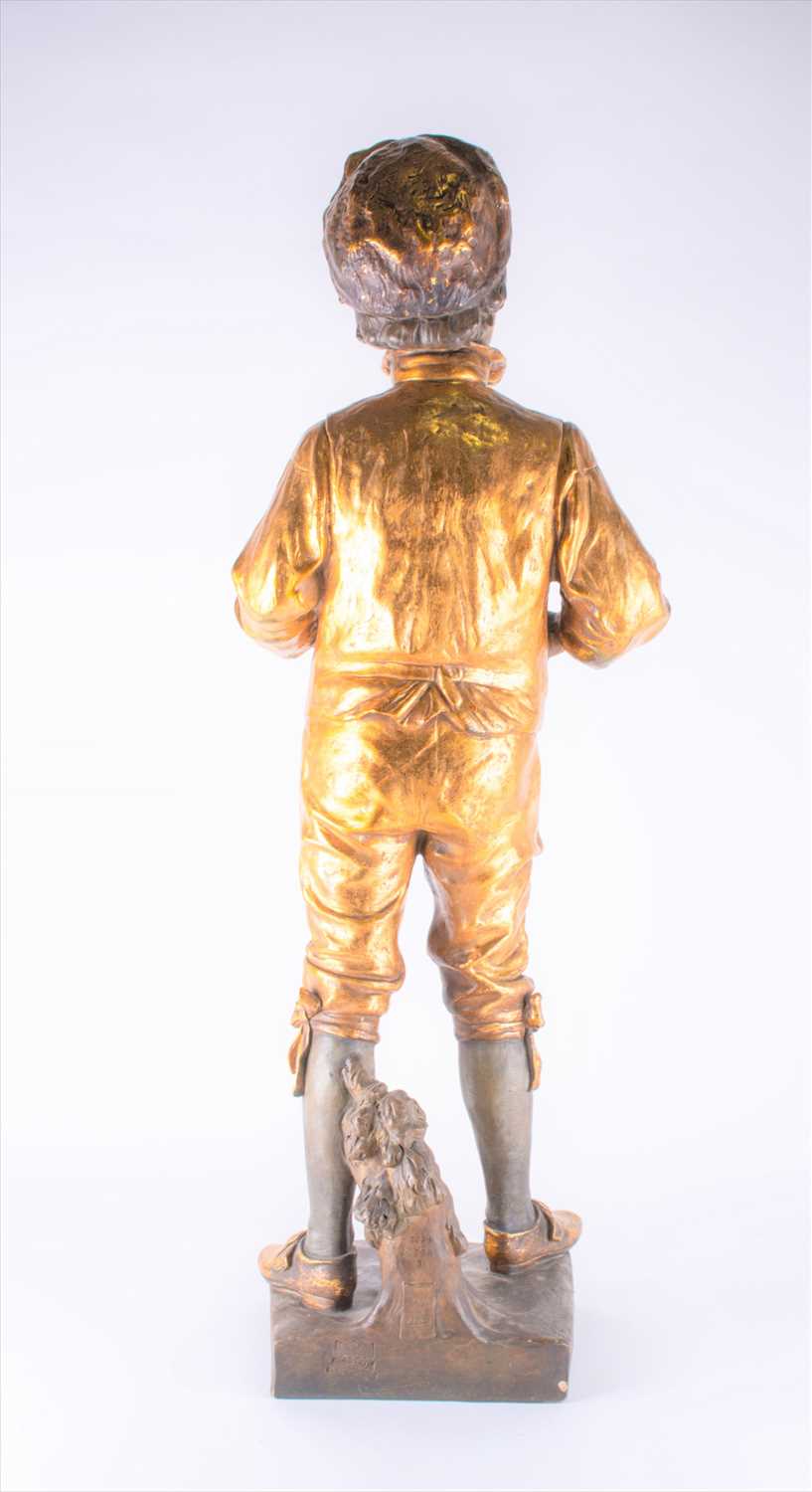 A large Goldscheider bronzed earthenware figure of a finely dressed boy his hands in his pockets - Image 9 of 9