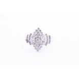 A diamond cluster ringset with a marquise-shaped cluster set with small round-cut diamonds, within