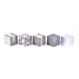 Mark Firth (born 1952) British Five solid aluminium wall hanging cubes from the 'Mass and